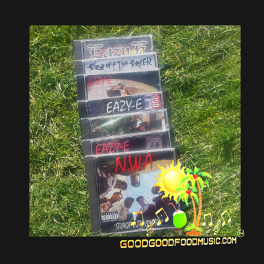 Six CDs Ruthless Records Eazy-E N.W.A displayed on grass
